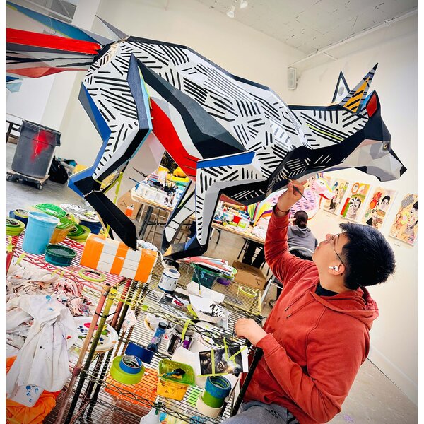 Franco working on the alebrije public art project for La Nube